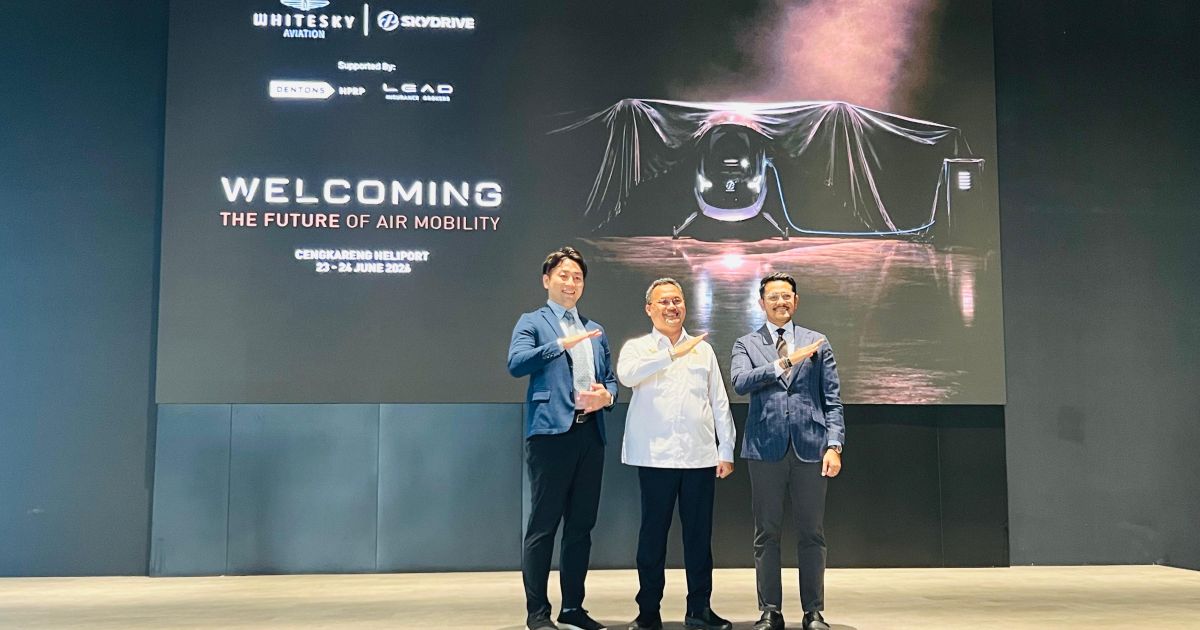 CEO Whitesky Group Denon Prawiraatmadja (center) and two executives from SkyDrive Inc. pose at Cengkareng Heliport in Tangerang, Indonesia's Banten Province on Tuesday, 23 June 2026 (Photo/Whitesky Group)