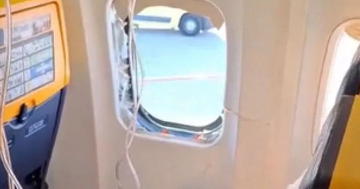 (A broken cabin window of Ryanair's flight FR1879 from Thessaloniki to Memmingen as engine failure and fragment struck it on Friday, 10 July 2026 (Photo/X/Aviation Voice)